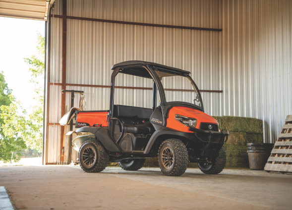 Kubota RTV 520 orange 2 seater in a barn