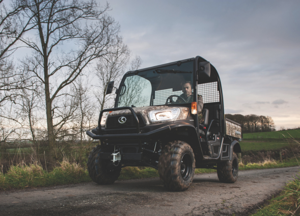 Kubota RTV X1110 lights on camo 2 seater cabin