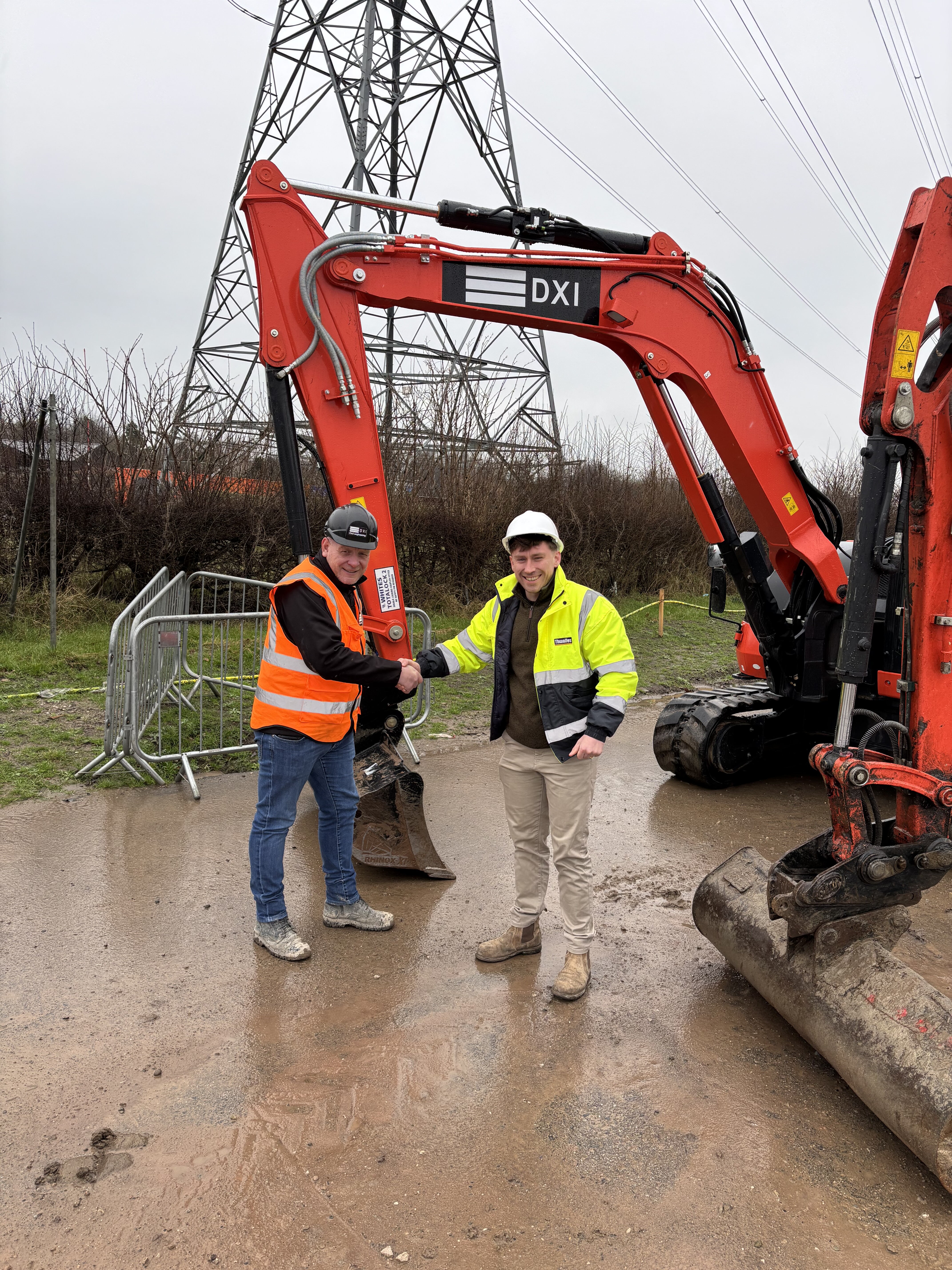 DXI Regeneration and BTE Plant Sales shake on an exciting new deal, pictured Joe Morris from BTE with Peter Williams Plant Manager for DXI